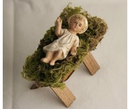Krippenfigur-Jesus-Kind-in-der-Holz-Krippe