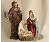 Krippenfiguren-Heilige-Familie-mit-dem-Jesuskind-in-der-Krippe